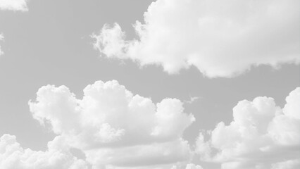 Wall Mural - Fluffy white clouds stretch across a seamless sky background. Background texture of fluffy white clouds. 