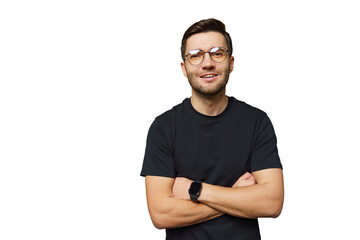 Man with glasses smiles confidently against a plain background, showcasing casual style and personality