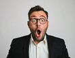 © Milla - Shock concept. Shocked business man with big eyes and open mouth wearing suit on white background