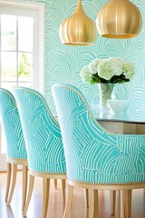 Wall Mural - Elegant Art Deco dining area featuring turquoise wallpaper, gold pendant lights, and soft blue upholstered chairs in a stylish setting