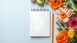 © Surachate - Minimalist notepad layout featuring a pristine white surface, a sharpened pencil, inviting creativity and organization in a serene workspace.