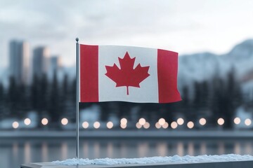 canadian flag on a pole with a blurred snowy forest background. national identity and patriotism.