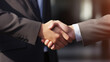 © FlyStun - Deux personnes en costume se serrant la main. Business, travail, accord, contrat. Pour conception et création graphique.