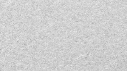 Poster - A white wall with a rough texture. The wall is covered in a white paint that has a grainy texture