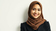 © Repsi - Professional Portrait of Asian Muslim woman, Malaysian, indonesian, thailand, japanese, brunei in a black hijab and formal black suit smiling confidently with a clean white background