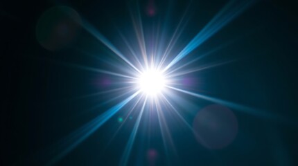 Wall Mural - Bright starburst lens flare on black background.