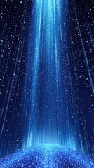 Wall Mural - luminous blue light beam descending on dark surface creating sparkling glitter effect