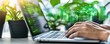 © AI Studio - Person typing on a laptop with data visualizations in an office setting