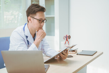 Wall Mural - Male doctor treating male urinary tract diseases, providing consultations at a hospital,discussing urinary tract models,diagnosing urethritis,prostatitis,cystitis, pyelonephritis,offering effective