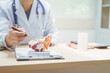 © R Photography - Male doctor treating ear diseases at a hospital, discussing conditions like deafness,tinnitus, sudden hearing loss,otitis, Ménière's disease, dislodged inner ear stones,hearing impairment, providing