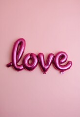 Wall Mural - a pink balloon lettering of the word love on a pink background