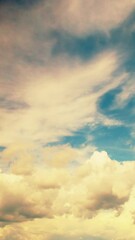 Wall Mural - Calm sky with slowly moving clouds. Tinted romantic background in pastel colors.
