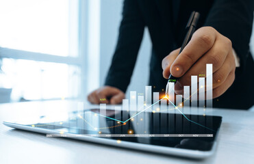 Leinwandbilder - Business growth graph chart. Businessman using tablet analyzing sales data and financial report.Financial marketing graph grow chart. Arrow up with graph corporate future growth plan.