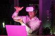 © Westend61 - Mature freelancer using virtual reality simulator near laptop at home office