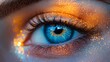 © Juan - Close-Up of a Glittering Blue Eye