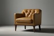 © Ayaz - A tan leather armchair with a buttoned back and tapered legs