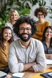 © พงศ์พล วันดี - Cheerful Hispanic Latinx Individuals Gathered in a Bright, Green Office Environment
