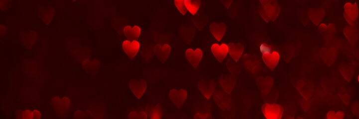 Wall Mural - Red hearts, sparkling glitter bokeh background banner, valentines day abstract defocused texture header