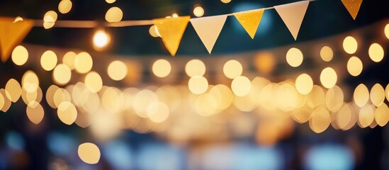 Wall Mural - elegant golden bokeh with soft white highlights and festive triangular banners creating a glamorous 