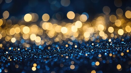 Wall Mural - abstract bokeh background with golden and blue colored lights and glittering texture suitable for va