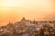 © robertharding - Atmospheric sunset above historic Albaicin and Iglesia de San Cristobal, UNESCO, viewed from San Miguel Alto, Albaicin, Granada, Andalucia, Spain