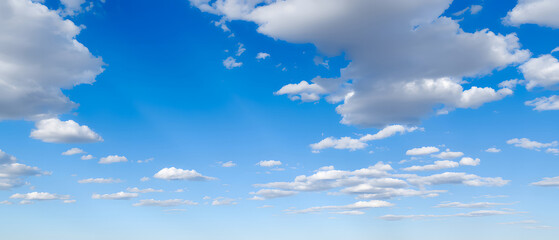 Wall Mural - blue sky with floating cloud patterns, even illumination