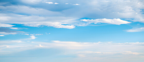Wall Mural - a serene blue sky with scattered clouds, cinematic atmosphere, sharp focus