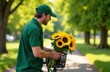 © Kseniia - A courier in a green T-shirt and cap delivers a bouquet of large sunflowers. Ideal for advertising flower delivery and congratulations