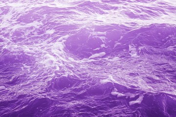 Wall Mural - violet colored clear water. crystal clear ocean water surface on a tropical exotic beach.