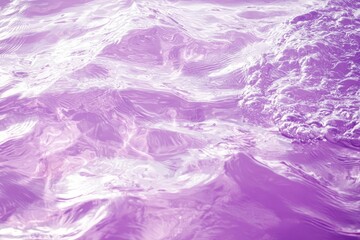 Wall Mural - violet colored clear water. crystal clear ocean water surface on a tropical exotic beach.