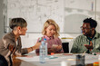 © Zamrznuti tonovi - Marketing team discussing new campaign during a meeting in the office
