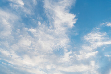 Wall Mural - Clouds at the sky. Cloudscape - Blue sky and white clouds. Beautiful blue sky background with clouds. White fluffy clouds in the blue sky. Blue sky and white clouds of daytime