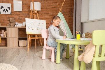 Poster - Little girl drawing on table at home