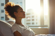 © Katya - Mindfulness practice for stress relief in a sunlit bedroom setting