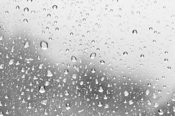 Wall Mural - PNG Raindrops on glass surface background droplets texture.