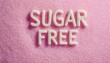 © Montalumirock - Sugar free text on pile pink background for motivation healthy lifestyle