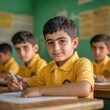 © Maftuh - Young Boy Focused on Studies in a Classroom