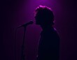 © zerostudio.id - Singer Silhouette Purple Stage Lighting Music Concert