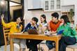 © NINENII - Education knowledge and university concept - group of students reading and preparing for exams on holiday.