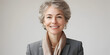 © Tengkwa - Silver Lining:  A mature woman with short, silver hair radiates confidence and warmth, her genuine smile and bright eyes suggesting experience, wisdom, and an optimistic outlook.