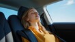 © Thi - Relaxed woman peacefully sleeping in the comfort of her autonomous car during a serene journey.