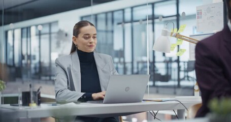 Aufkleber - Portrait of a Caucasian Manager Using Laptop, Reviewing Sales and Marketing Reports on a Computer. Beautiful Female Analyzing Data to Identify Key Trends and Opportunities in a Modern Office