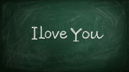 vintage dark green chalkboard with the text written with white chalk i love you. love concept