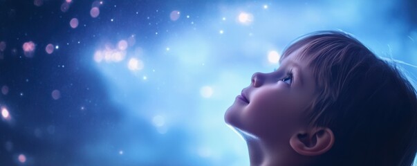Wall Mural - a child's face full of wonder as they gaze up at the stars.
