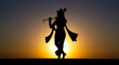 © Deepa - Lord Krishna Silhouette Playing Flute at Sunrise with Flowing Scarf