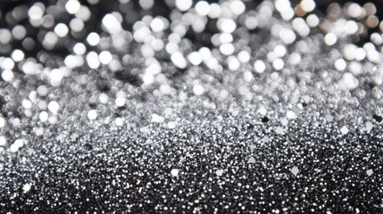 Wall Mural - Sparkling silver glitter backdrop creating an elegant bokeh effect for festive or artistic design projects.
