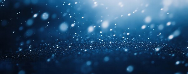 Wall Mural - snowflakes falling gently against a dark blue winter night sky.