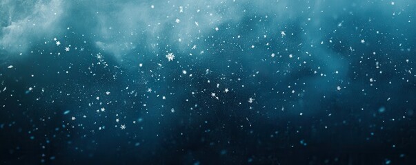 Wall Mural - snowflakes falling gently against a dark blue winter night sky.