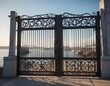 © Prasert - Detailed photo of a metal gate at the entrance to a sea port, wooden planks, sea port, gate