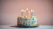 © Hussain - A colorful birthday cake with candles. isolated on white background
